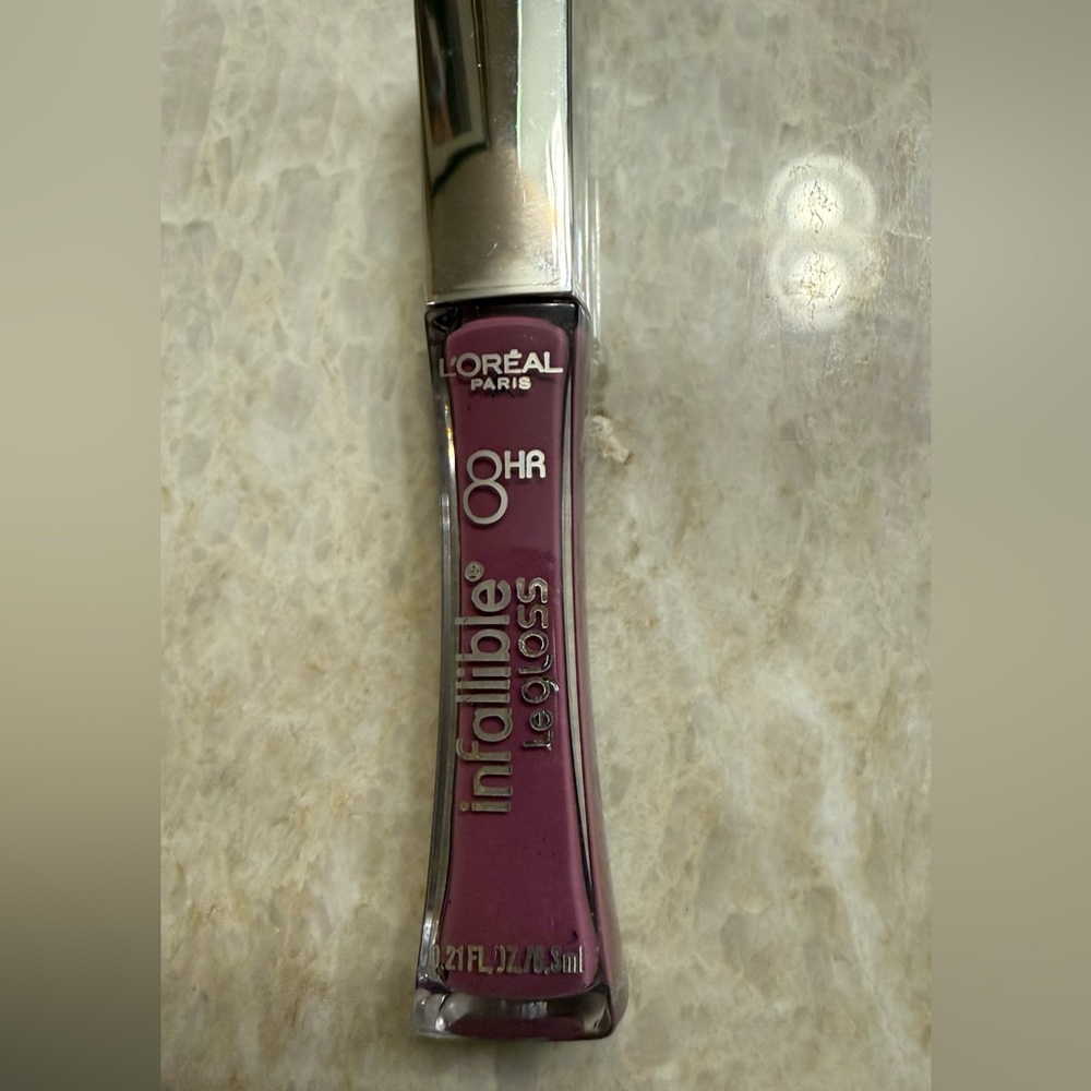 L’Oreal Infallible Lip Gloss in Dusty Plum
8 hours. 
Undeniable Mauve - 515
